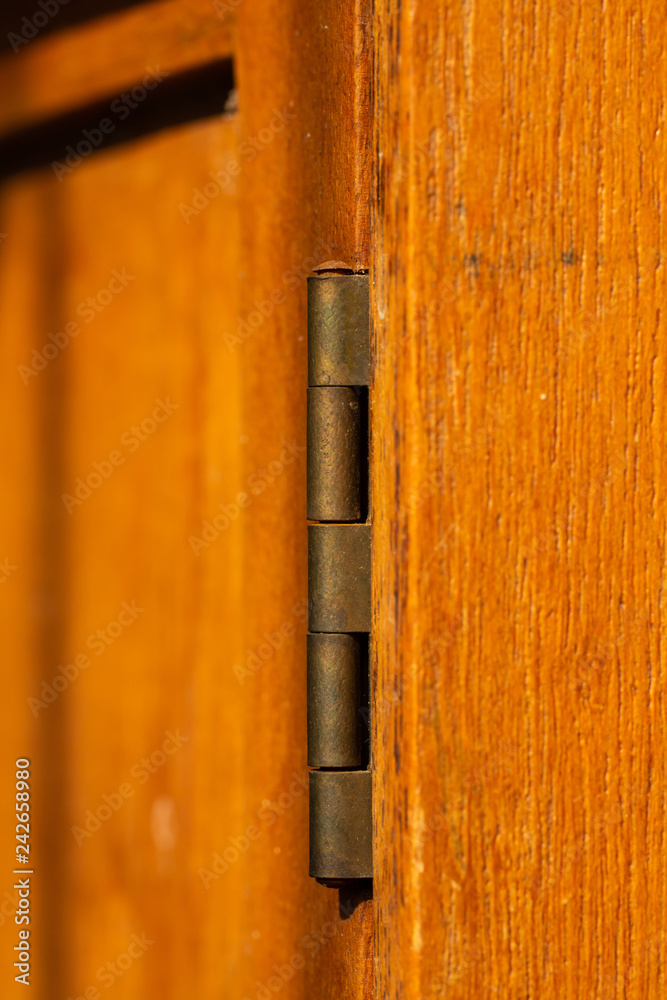 Damaged wooden door, Wooden door repaired by glue and grey adhesive tape, Close up & Macro shot, Selective focus