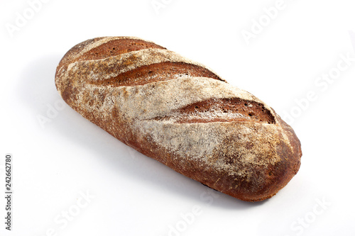 Fresh bread on white background. Beautifully sprinkled with flour.