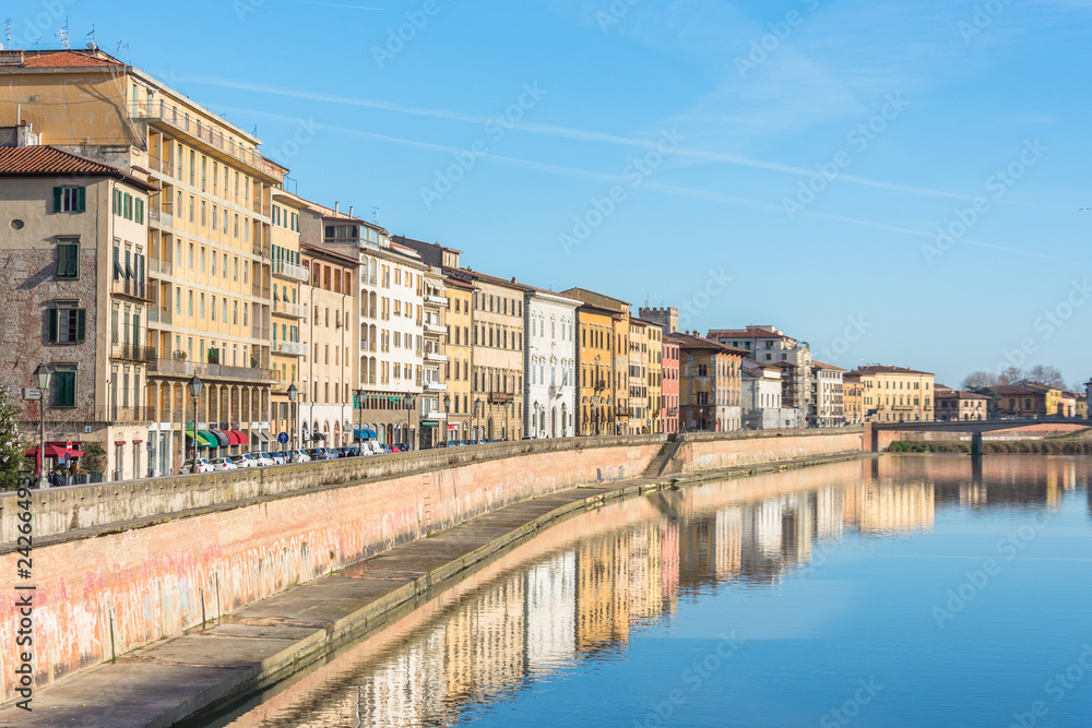 View on embankment of Arno river Pisa, Italy.