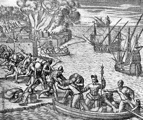 conquest of the Inca empire by Spanish conquistador Francisco Pizarro in XVI century:  Spanish soldiers move their loot on board to the ships photo