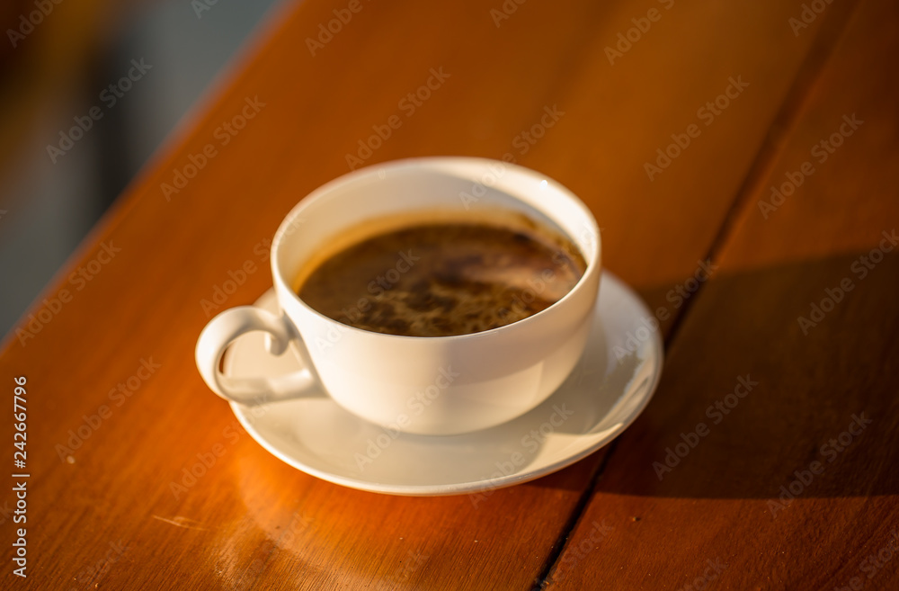 coffee cup  on wood table.