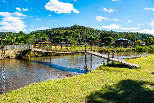 Small canal with mountain in Mueang Khong district photo