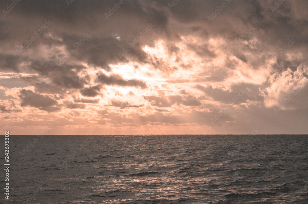 Sunset sea overcast