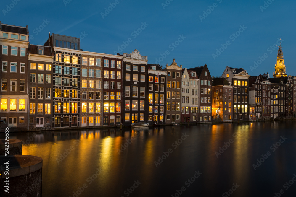 Facades of traditional colorful Dutch houses in Amsterdam, Holland