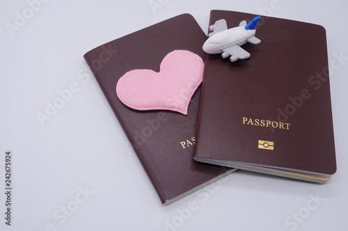 Top view and close up: Two passports and airplanes toy for travel concept. 
