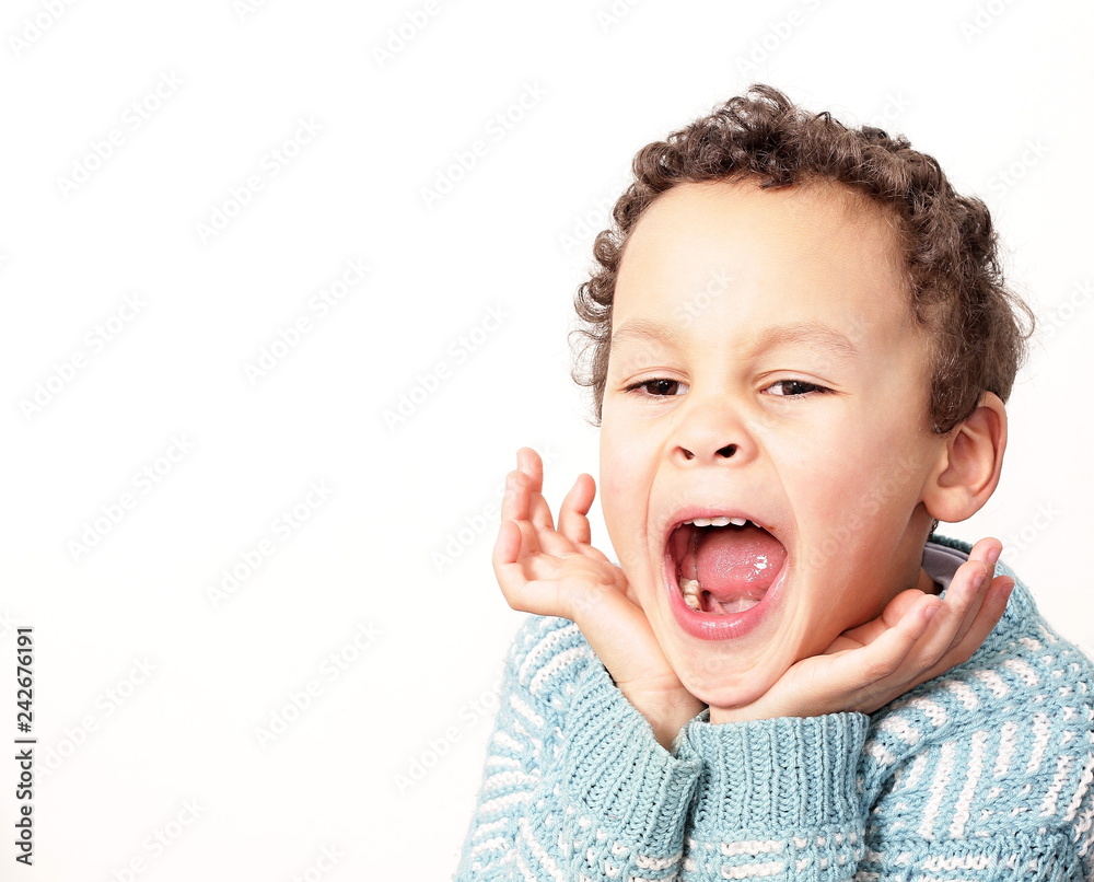 little boy yawning with textured background little boy yawning with textured background