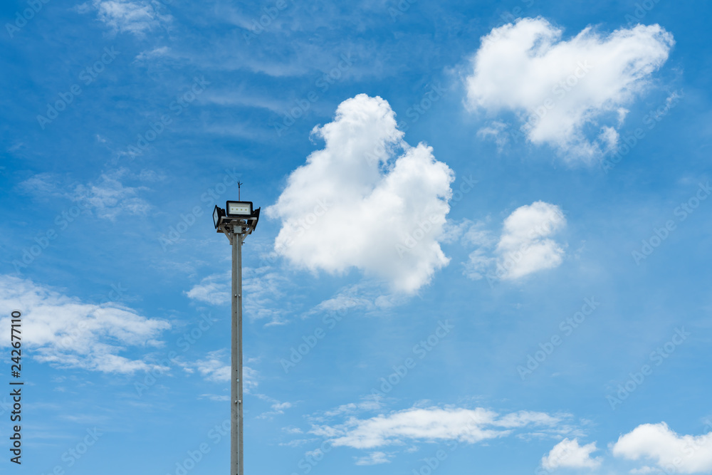LED lights steel led lights with blue sky and cloud background. LED lights with solar cells power. LED lights steel led lights with blue sky and cloud background. LED lights with solar cells power.
