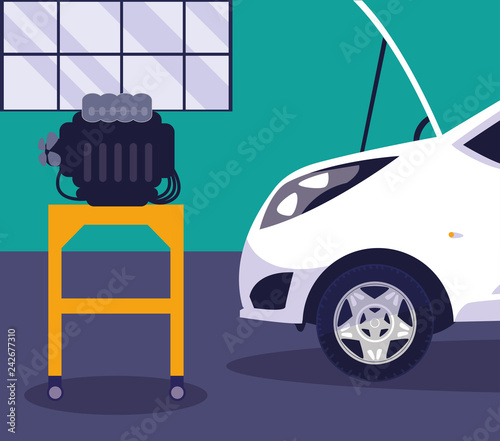 white car in maintenance workshop
