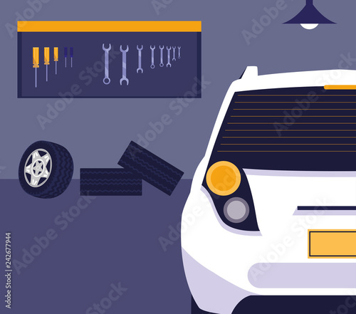 white car in maintenance workshop
