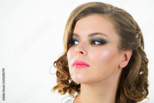 Elegant makeup concept. Retro and vintage. Girl with perfect healthy skin and beautiful makeup. Girl retro hairstyle and makeup close up. Woman confident face with makeup on white background