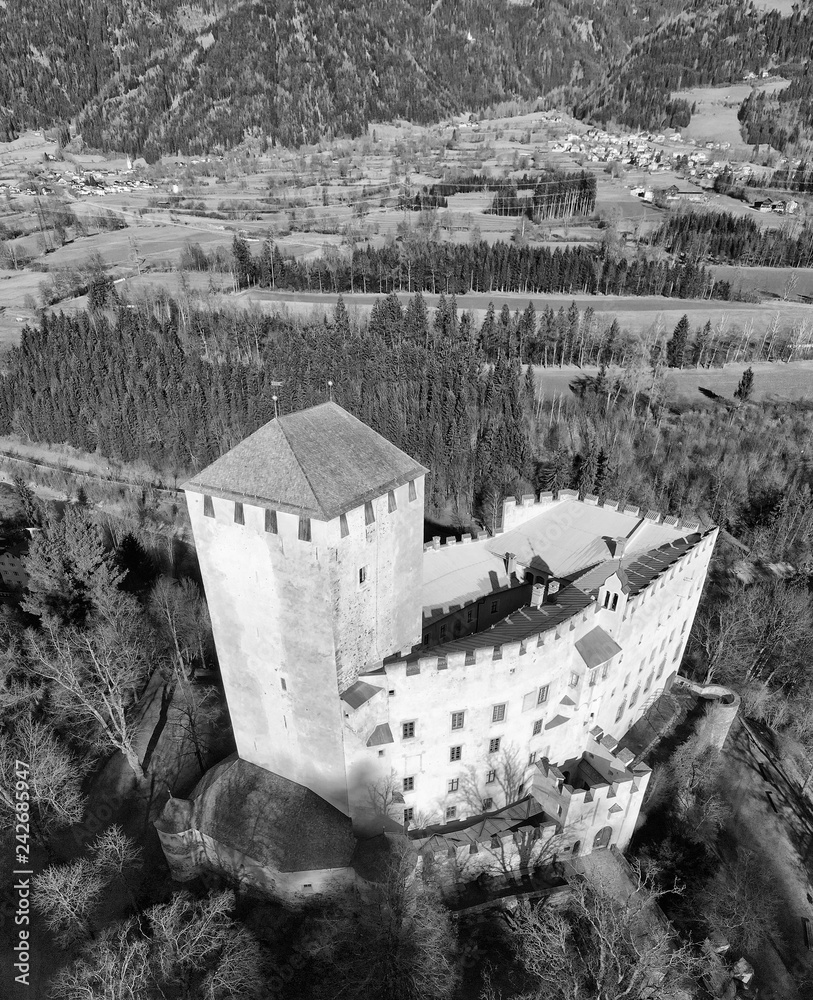Obraz premium Aerial view of Lienz Castle and valley in winter season, Austria