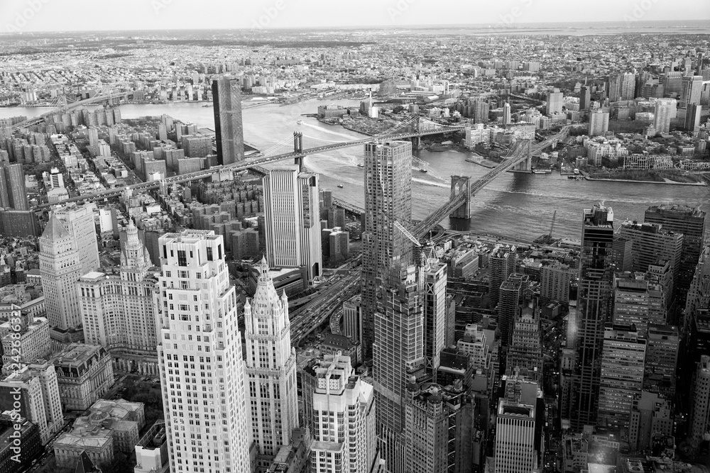 Brooklyn, Manhattan and Williamsburg Bridge at sunset, amazing aerial view of New York City - USA