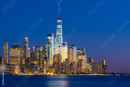 a magnificent view of Lower Manhattan and the financial district at sunset  New York City