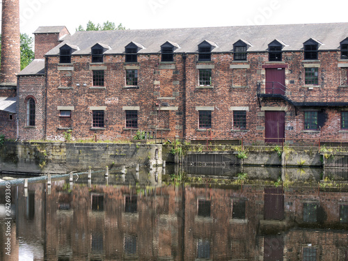 Old Victorian Mill on River Aire, Hunslet, Leeds photo