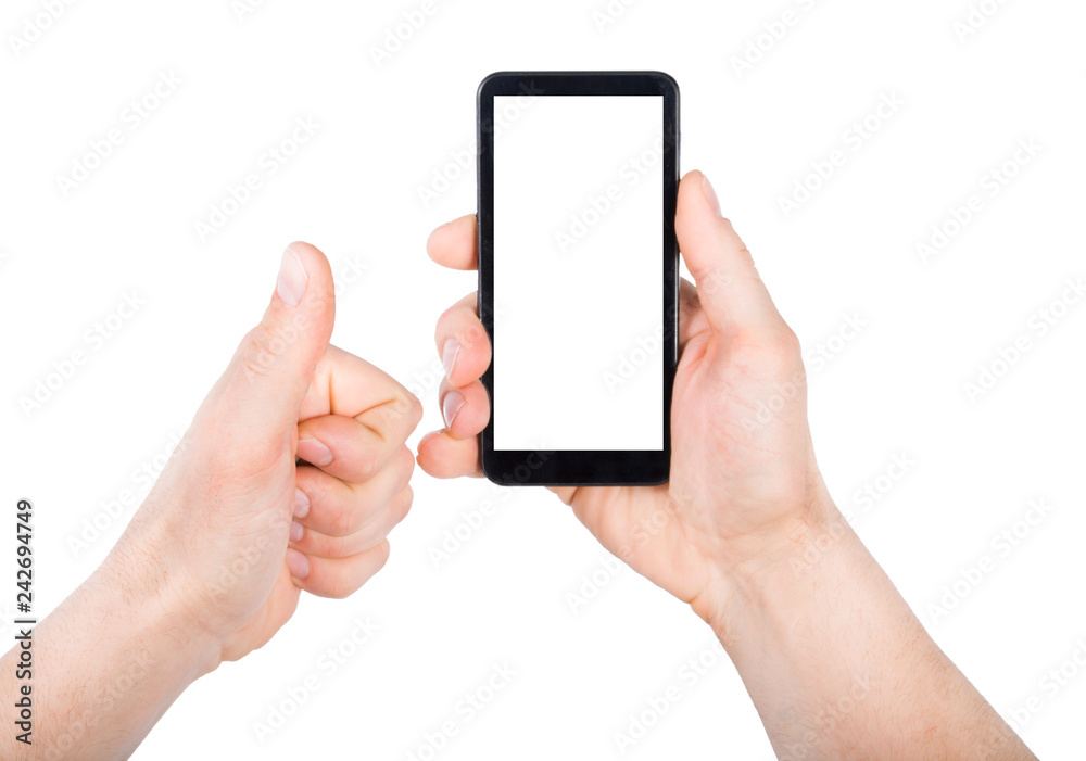 A man holding smartphone in hand and other hand showing thumb up A man holding smartphone in hand and other hand showing thumb up