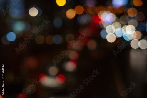 Bokeh night light on the avenue Light night at city blue bokeh sky festival abstract background blur lens flare reflection beautiful circle street with dark © aboutnuylove