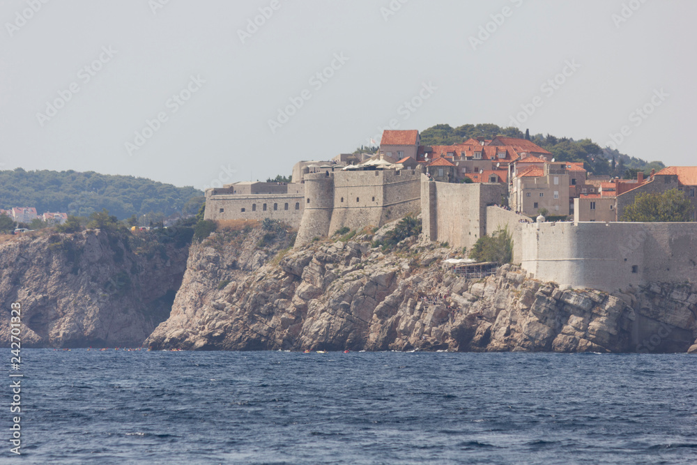 DUBROVNIK, CROATA - AUGUST 22 2017: view from lokrum island of Dubrovnik ancient walls DUBROVNIK, CROATA - AUGUST 22 2017: view from lokrum island of Dubrovnik ancient walls