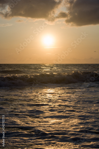 Amazing sea sunset  the sun  waves  clouds