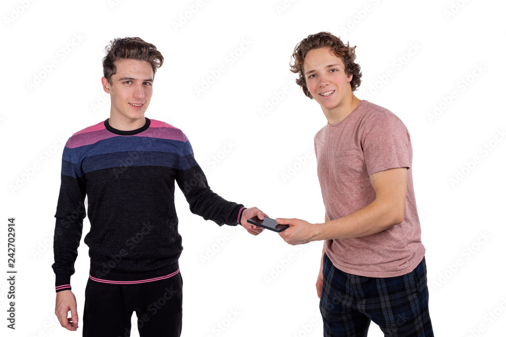 Portrait of a two happy young men using mobile phones isolated over white background Portrait of a two happy young men using mobile phones isolated over white background