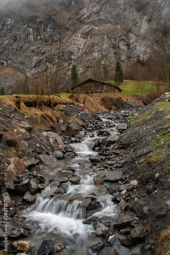 A flowing stream in Lauterbrunnen A flowing stream in Lauterbrunnen