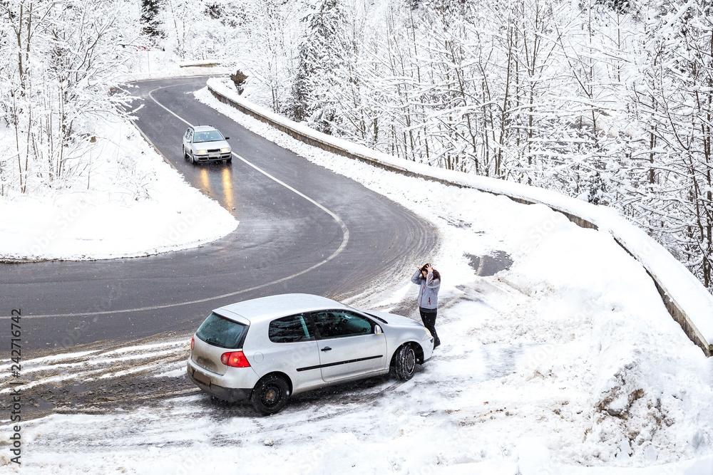 Woman panicked by the car broke through mountain serpentines in the winter Woman panicked by the car broke through mountain serpentines in the winter