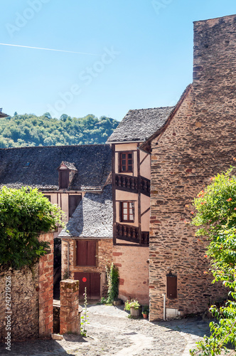 Streets of Conques in the mountains of southern France on a sunny day