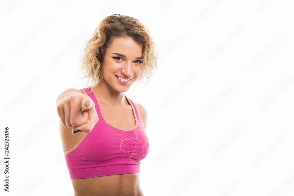 Portrait of beautiful young fit girl pointing camera Portrait of beautiful young fit girl pointing camera