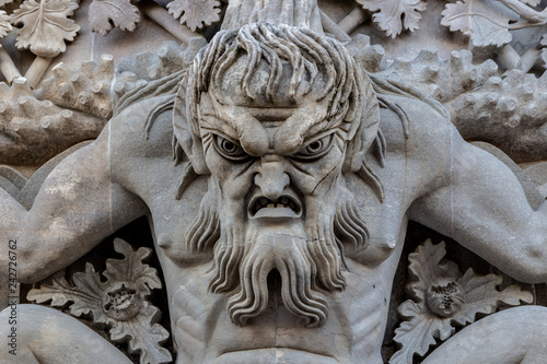 Triton over the lancet arch, Pena National Palace, Romanticist palace in Sintra