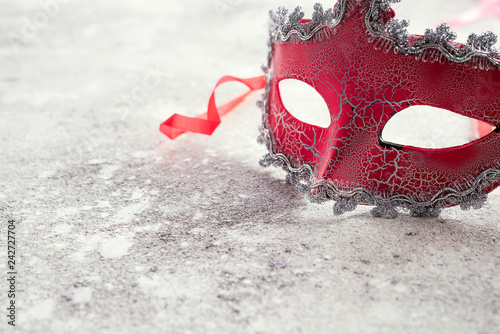 Photography beautiful red carnival mask for carnival holiday background concept on stone, Hu