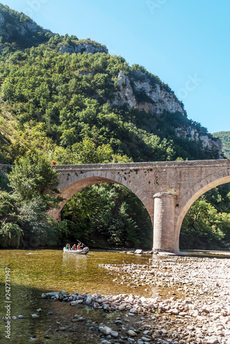 LA MADELEINE, DORDOÑA, FRANCE - SEPTEMBER 2014. Canoeists on the river sailing on a sunny day.