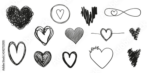 Hand drawn grunge hearts on isolated white background. Set of love signs. Unique image for design. Black and white illustration. Elements for design