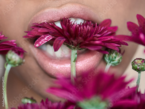 Close up of woman with flowers photo