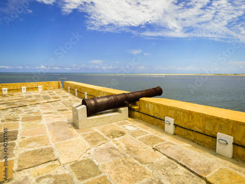Old cannon inside Santa Cruz Fort (commonly known as Fort Orange), old Dutch and later Portuguese fort on Itamaraca Island, Brazil