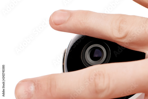 Wallpaper Mural privacy protection concept. hand closes surveillance camera from shooting. isolated Torontodigital.ca