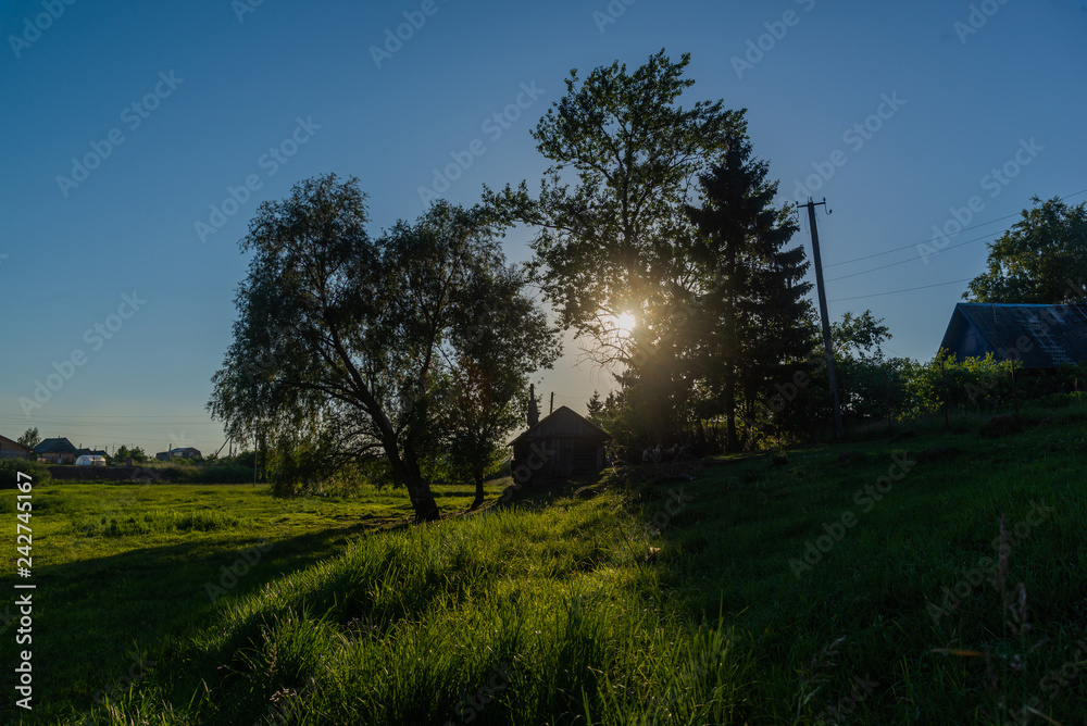 Backlit landscape with rural view Backlit landscape with rural view
