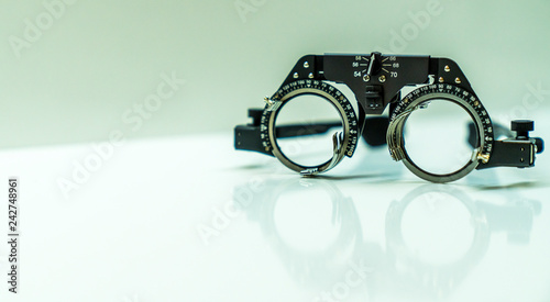 Close up of a pair of eyeglasses measuring instrument.