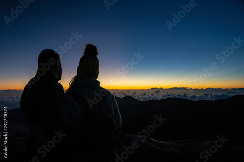 silhouette of couple at sunrise