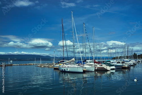 Yachts in a harbor in Tholon on Lake Geneva in France. © GKor