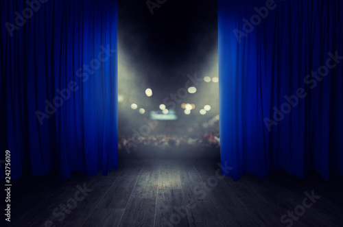 Bild auf Leinwand The blue curtains are opening for the theater show