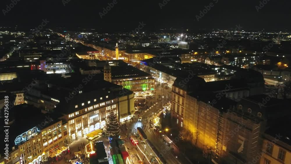 Aerial view: Darmstadt at night. Flying over the Central square with the old Town Hall Aerial view: Darmstadt at night. Flying over the Central square with the old Town Hall