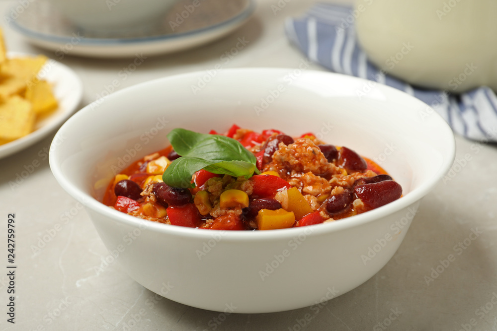 Bowl with chili con carne on table Bowl with chili con carne on table