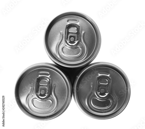 Top view of aluminum cans with beverage on white background