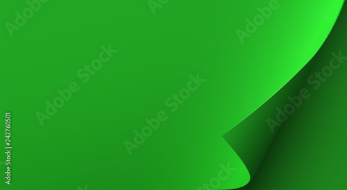 Green paper sheet with curled corner