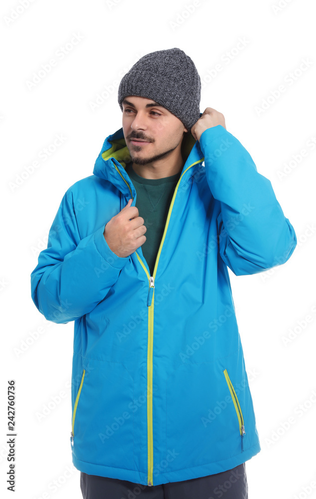 Young man wearing warm clothes on white background. Ready for winter vacation Young man wearing warm clothes on white background. Ready for winter vacation