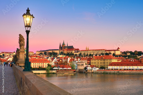 Charles Bridge in the morning with old Prague and St. Vitus cathedral