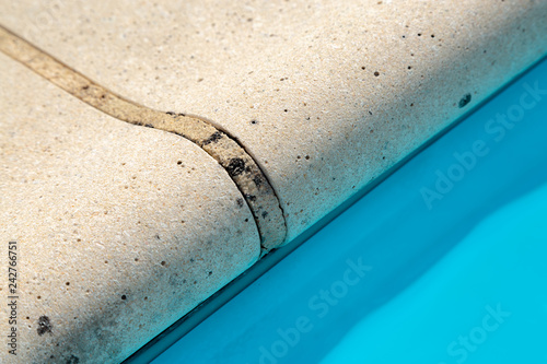 stone coping on the edge of a pool