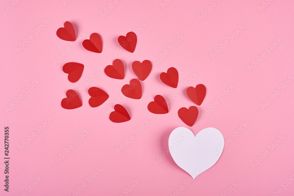 Valentines day. Hearts with gift box postcard. Paper flying elements on pink background.