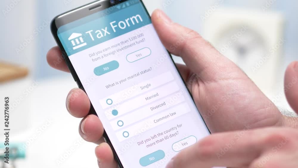 User filling an tax form on his smartphone screen. Closeup on the device.