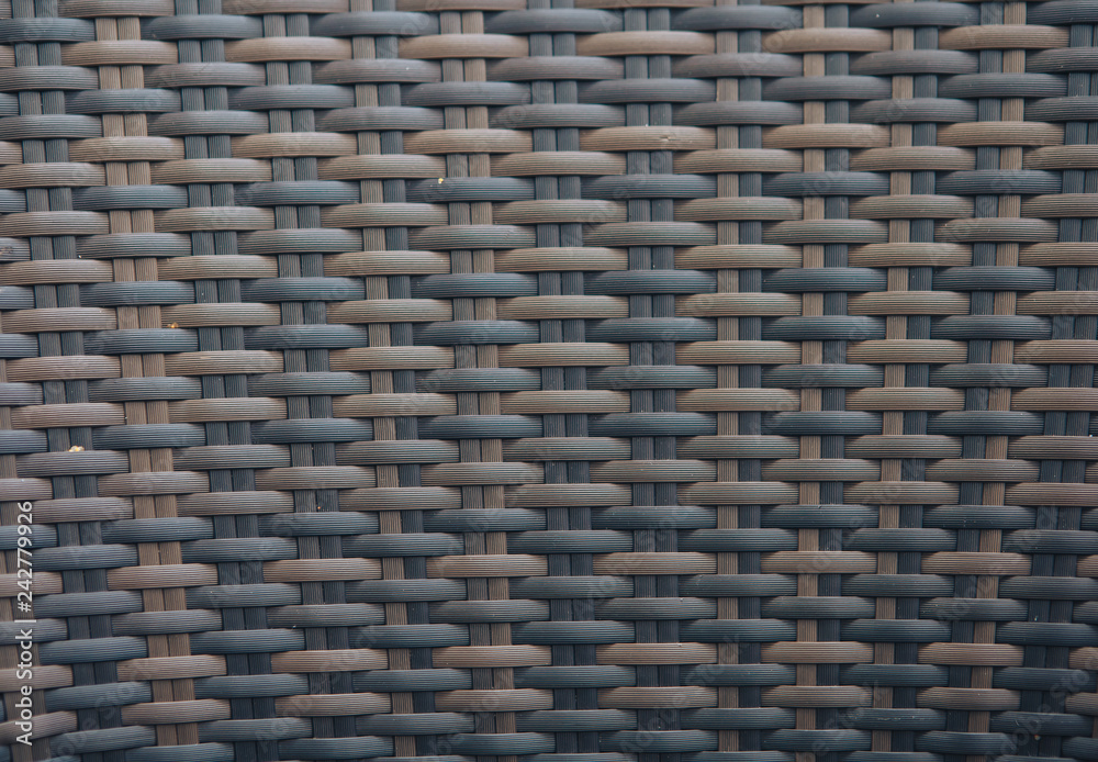 Rattan texture background. Texture wicker brown plastic Rattan texture background. Texture wicker brown plastic