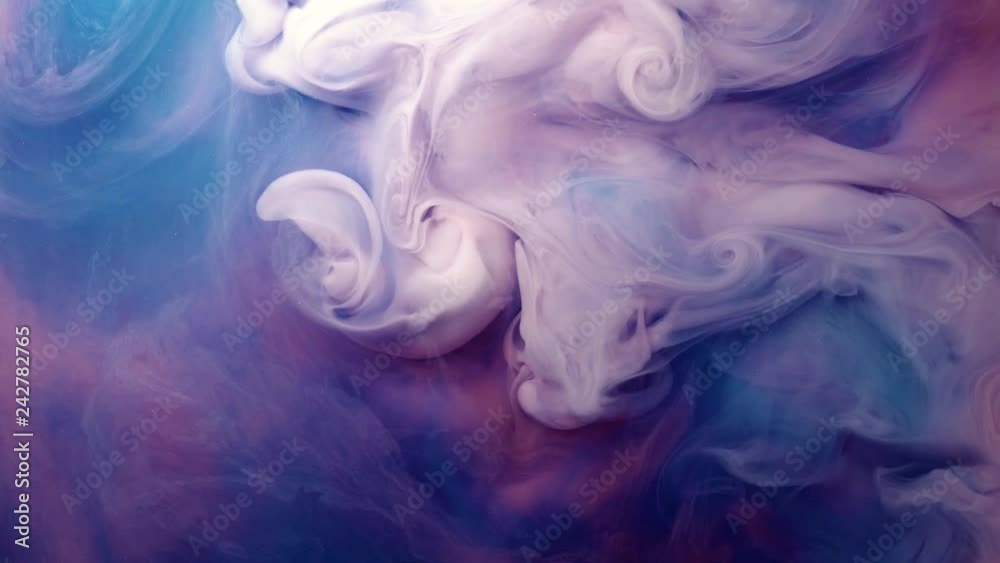 vivid colorful purple blue pink of acrylic paint drop motion texture background for abstract concept.